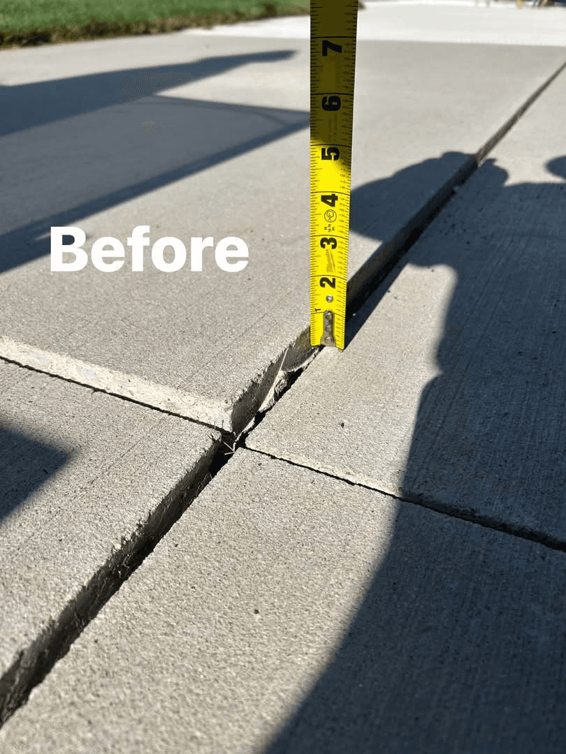 A tape measure showing how far the slab had dropped at the joint (labeled Before)