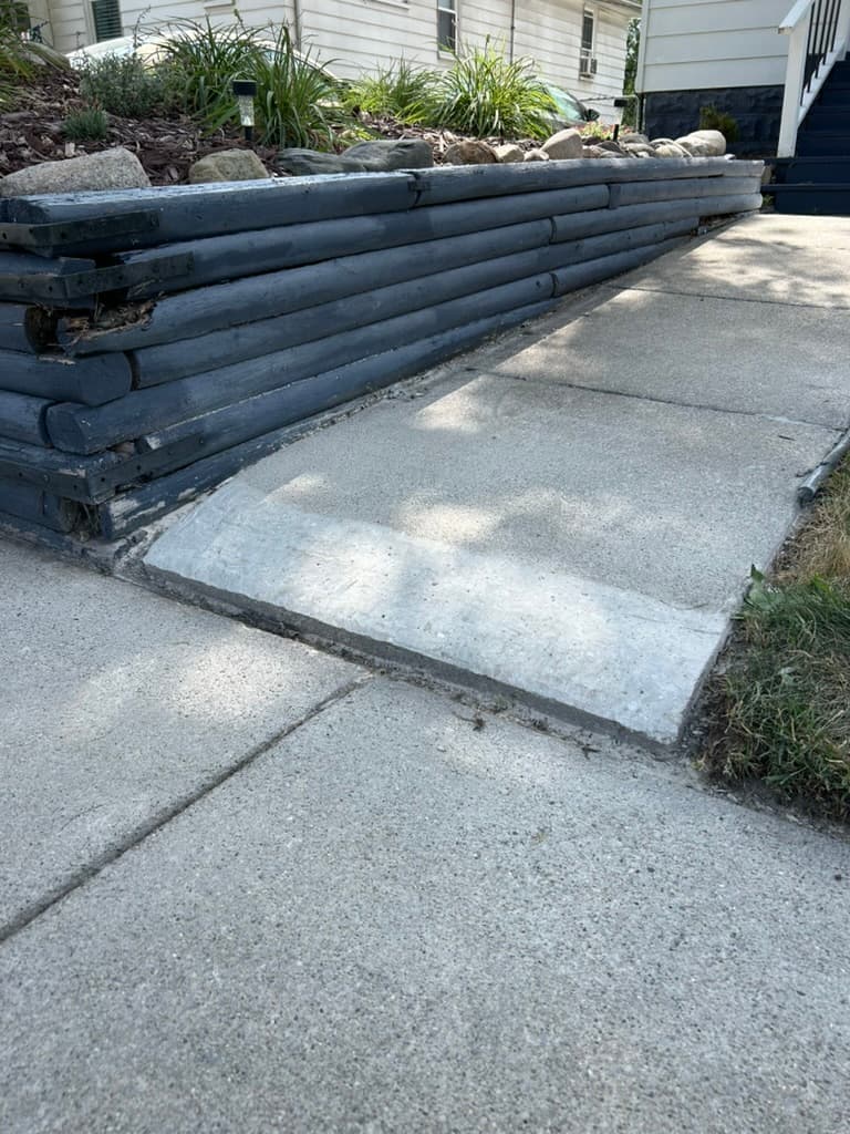 A leveled, smooth sidewalk walk path after repair